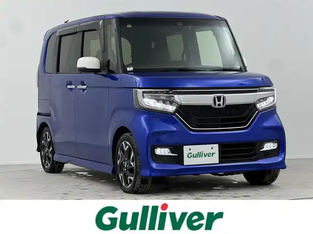 ホンダ Ｎ ＢＯＸ カスタム G EX ターボ ホンダセンシング 熊本県 2020(令2)年 3.8万km ブリリアントスポーティブルーメタリック2トーン ホンダセンシング/・衝突軽減ブレーキ（CMBS）/・車線維持支援システム（LKAS）/・アダプティブクルーズコントロール（ACC）/・後方誤発進抑制機能/・誤発進抑制機能/両側パワースライドドア/ハーフレザーシート/前席シートヒーター/純正SDナビ/地デジTV/【DVD/CD再生機能　Bluetooth接続】/バックカメラ/ドライブレコーダー（前後撮影）/革巻きステアリング/パドルシフト/ETC/LEDヘッドライト/ウインカーミラー/リアコーナーセンサー/純正15インチアルミホイル/サイド/カーテンエアバッグ/Honda スマートキー