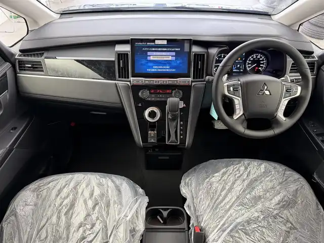 三菱 デリカＤ：５ ブラックエディション 愛知県 2025(令7)年 0.1千km グラファイトグレーメタリック/ブラックマイカ 登録済未使用車/4WD/ディーゼル/ターボ/e-Assist/  　・衝突軽減ブレーキシステム/　　・車線逸脱警報システム/　　・レーダークルーズコントロール/　　・オートマチックハイビーム/　　・BSM/アルパイン11インチナビ/　　CD/DVD/BT/フルセグ/アルパイン12.8インチ後席フリップダウンモニター/マルチアラウンドモニター/革巻きステアリング/ステアリングリモコン/パドルシフト/ステアリングヒーター/本革シート/パワーシート/シートヒーター/キャプテンシート/AC100V/両側パワースライドドア/電動サイドステップ/パワーバックドア/純正LEDヘッドライト/フォグランプ/純正18インチアルミホイール/取扱説明書/保証書/スペアキー