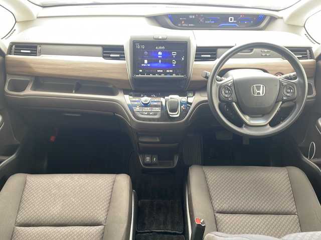 ホンダ フリード ハイブリット G ホンダセンシング 沖縄県 2021(令3)年 8.5万km プラチナホワイトパール 純正メモリナビ/　DTV/CD/DVD/USB/Bluetooth/バックカメラ/ビルトインETC/前後ドライブレコーダー/両側パワースライドドア/ホンダセンシング/レーダークルーズ/前席シートヒーター/アイドリングストップ/LEDヘッドライト/オートライト/純正フロアマット/プッシュスタート/スマートキ―