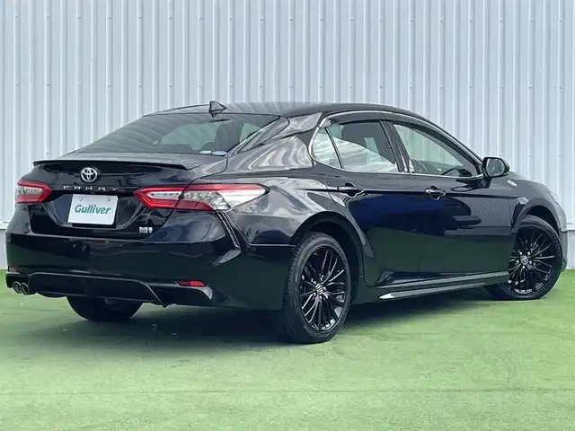 トヨタ カムリ WS ブラックエディション 香川県 2020(令2)年 5.1万km プレシャスブラックパール 純正ディスプレイオーディオ/（Bluetooth/USB）/前後ドライブレコーダー/バックカメラ/トヨタセーフティセンス/・プリクラッシュセーフティ/・アダプティブクルーズコントロール/・オートマチックハイビーム/・リアトラフィックアラート/・パーキングサポートブレーキ/・レーンディパーチャーアラート/ブラインドスポットモニター/クリアランスソナー/黒革シート/前席シートヒーター/革巻きステアリング/ステアリングスイッチ/パドルシフト/電動パーキングブレーキ/オートブレーキホールド/オートライト/LEDヘッドライト/LEDフォグライト/純正ビルトインETC/純正18インチアルミホイール/純正フロアマット/純正ドアバイザー/オート開閉機能付き電動格納ミラー/全席フルオートパワーウィンドウ/ISOFIX
