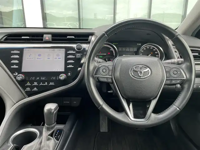 トヨタ カムリ WS ブラックエディション 香川県 2020(令2)年 5.1万km プレシャスブラックパール 純正ディスプレイオーディオ/（Bluetooth/USB）/前後ドライブレコーダー/バックカメラ/トヨタセーフティセンス/・プリクラッシュセーフティ/・アダプティブクルーズコントロール/・オートマチックハイビーム/・リアトラフィックアラート/・パーキングサポートブレーキ/・レーンディパーチャーアラート/ブラインドスポットモニター/クリアランスソナー/黒革シート/前席シートヒーター/革巻きステアリング/ステアリングスイッチ/パドルシフト/電動パーキングブレーキ/オートブレーキホールド/オートライト/LEDヘッドライト/LEDフォグライト/純正ビルトインETC/純正18インチアルミホイール/純正フロアマット/純正ドアバイザー/オート開閉機能付き電動格納ミラー/全席フルオートパワーウィンドウ/ISOFIX