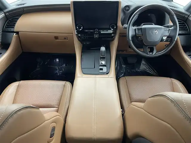 トヨタ ヴェルファイア ハイブリット Z プレミア 埼玉県 2024(令6)年 1.8万km プラチナホワイトパールマイカ ムーンルーフ　後席モニター　茶革　３６０°　ＢＳＭ　純正１４型ナビ　両側電動　オットマン　温シート　ベンチレーション　デジタルインナーミラー　ＨＵＤ　スペアタイヤ　アドバンストパーク　ＥＴＣ　