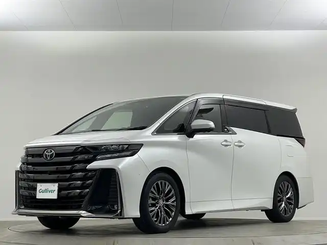 トヨタ ヴェルファイア ハイブリット Z プレミア 埼玉県 2024(令6)年 1.8万km プラチナホワイトパールマイカ ムーンルーフ　後席モニター　茶革　３６０°　ＢＳＭ　純正１４型ナビ　両側電動　オットマン　温シート　ベンチレーション　デジタルインナーミラー　ＨＵＤ　スペアタイヤ　アドバンストパーク　ＥＴＣ　
