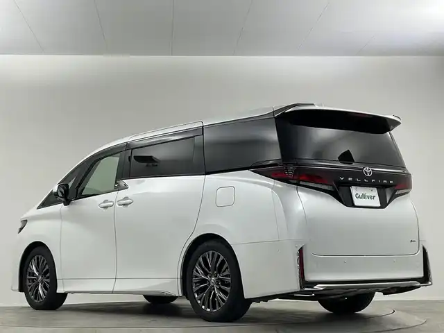トヨタ ヴェルファイア ハイブリット Z プレミア 埼玉県 2024(令6)年 1.8万km プラチナホワイトパールマイカ ムーンルーフ　後席モニター　茶革　３６０°　ＢＳＭ　純正１４型ナビ　両側電動　オットマン　温シート　ベンチレーション　デジタルインナーミラー　ＨＵＤ　スペアタイヤ　アドバンストパーク　ＥＴＣ　
