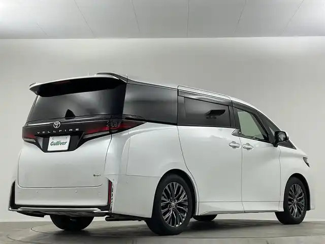 トヨタ ヴェルファイア ハイブリット Z プレミア 埼玉県 2024(令6)年 1.8万km プラチナホワイトパールマイカ ムーンルーフ　後席モニター　茶革　３６０°　ＢＳＭ　純正１４型ナビ　両側電動　オットマン　温シート　ベンチレーション　デジタルインナーミラー　ＨＵＤ　スペアタイヤ　アドバンストパーク　ＥＴＣ　