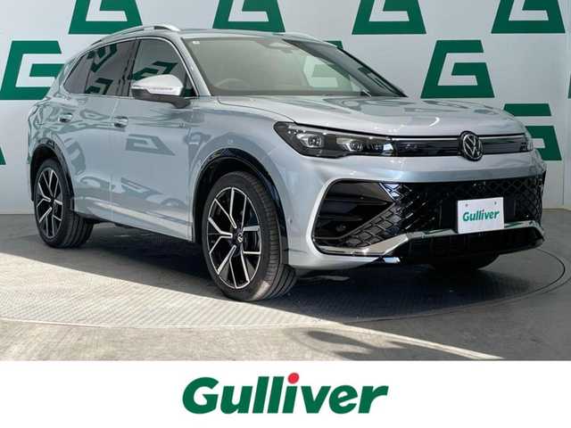 フォルクスワーゲン ＶＷ ティグアン eTSI Rライン 鹿児島県 2025(令7)年 0.1万km シルバー ワンオーナー/ラグジュアリーパッケージ/・電動パノラマスライディングルーフ/・Harman/Kardonプレミアムサウンドシステム/レザーシートパッケージ/・レザーシート/・前席リラクゼーション機能付シート/・前席ポジションメモリー付パワーシート/・前席座面調整式シート/・シートベンチレーション/R-Line専用エクステリア/純正15インチインフォテイメントシステム/10.25インチデジタルメータークラスター/アラウンドビューカメラ/フォルクスワーゲンオールインセーフティ/インテリアアンビエントライト/LEDマトリックスヘッドライト/パワーテールゲート/プログレッシブステアリング/純正20インチアルミホイール/純正フロアマット/ETC2.0/保証書/取説書