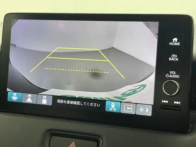 ホンダ ヴェゼル ハイブリッド e:HEV Z 熊本県 2025(令7)年 0.1万km未満 クリスタルブラックパール 登録済未使用車　/純正ナビ（ＡｐｐｌＣａｒＰｌａｙ・ＡｎｄｒｏｉｄＡｕｔｏ・フルセグ・ＢＴ・ＵＳＢ）/バックカメラ　/ビルトインETC2.0/前席シートヒーター　/前後クリアランスソナー　/アイドリングストップ　/横滑り防止/ダウンヒルアシスト/ホンダセンシング/・衝突軽減ブレーキ/・誤発進抑制機能/・後方誤発進抑制機能/・近距離衝突軽減ブレーキ/・歩行者事故低減ステアリング/・路外逸脱制御機能/・アダブティブクルーズコントロール/・渋滞運転支援機能/・先行車発進お知らせ/・標識認識システム/・ブラインドスポットモニター/・車線維持支援システム/・オートハイビーム/パワーバックドア/ステアリングヒーター/置くだけ充電/ハーフレザーシート/純正１８インチAW/オートライト/LEDヘッドライト/スマートキー/プッシュスタート/スペアキー1本/保証書/取扱説明書