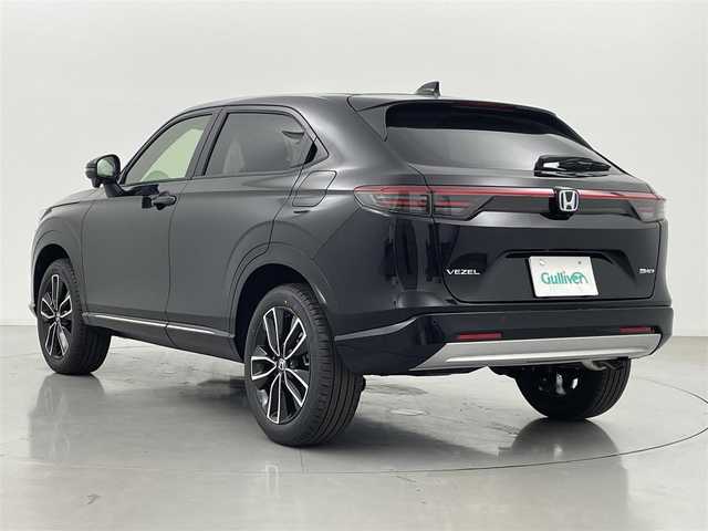 ホンダ ヴェゼル ハイブリッド e:HEV Z 熊本県 2025(令7)年 0.1千km クリスタルブラックパール 登録済未使用車　/純正ナビ（ＡｐｐｌＣａｒＰｌａｙ・ＡｎｄｒｏｉｄＡｕｔｏ・フルセグ・ＢＴ・ＵＳＢ）/バックカメラ　/ビルトインETC2.0/前席シートヒーター　/前後クリアランスソナー　/アイドリングストップ　/横滑り防止/ダウンヒルアシスト/ホンダセンシング/・衝突軽減ブレーキ/・誤発進抑制機能/・後方誤発進抑制機能/・近距離衝突軽減ブレーキ/・歩行者事故低減ステアリング/・路外逸脱制御機能/・アダブティブクルーズコントロール/・渋滞運転支援機能/・先行車発進お知らせ/・標識認識システム/・ブラインドスポットモニター/・車線維持支援システム/・オートハイビーム/パワーバックドア/ステアリングヒーター/置くだけ充電/ハーフレザーシート/純正１８インチAW/オートライト/LEDヘッドライト/スマートキー/プッシュスタート/スペアキー1本/保証書/取扱説明書