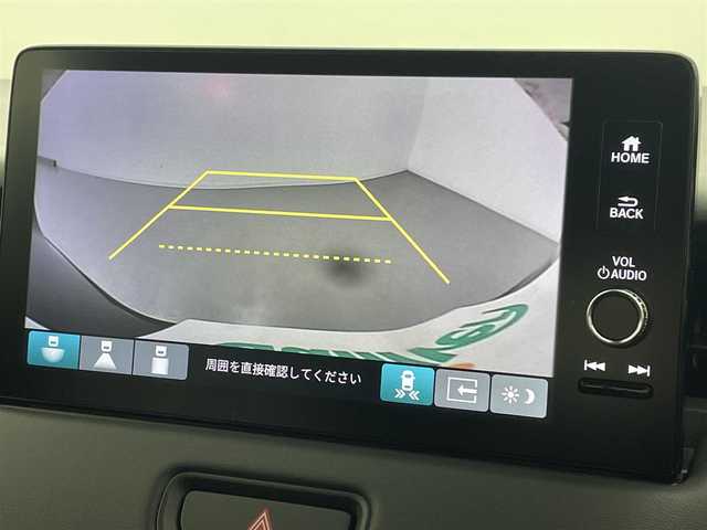 ホンダ ヴェゼル ハイブリッド e:HEV Z 熊本県 2025(令7)年 0.1千km クリスタルブラックパール 登録済未使用車　/純正ナビ（ＡｐｐｌＣａｒＰｌａｙ・ＡｎｄｒｏｉｄＡｕｔｏ・フルセグ・ＢＴ・ＵＳＢ）/バックカメラ　/ビルトインETC2.0/前席シートヒーター　/前後クリアランスソナー　/アイドリングストップ　/横滑り防止/ダウンヒルアシスト/ホンダセンシング/・衝突軽減ブレーキ/・誤発進抑制機能/・後方誤発進抑制機能/・近距離衝突軽減ブレーキ/・歩行者事故低減ステアリング/・路外逸脱制御機能/・アダブティブクルーズコントロール/・渋滞運転支援機能/・先行車発進お知らせ/・標識認識システム/・ブラインドスポットモニター/・車線維持支援システム/・オートハイビーム/パワーバックドア/ステアリングヒーター/置くだけ充電/ハーフレザーシート/純正１８インチAW/オートライト/LEDヘッドライト/スマートキー/プッシュスタート/スペアキー1本/保証書/取扱説明書