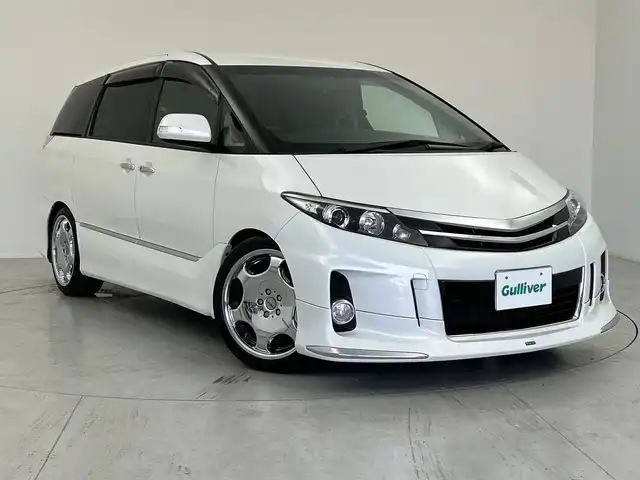 トヨタ エスティマ アエラス プレミアムエディション 愛知県 2014(平26)年 5.3万km ホワイトパールクリスタルシャイン ＡＬＰＩＮＥナビ/・Ｂｌｕｅｔｏｏｔｈ/・ＣＤ/・ＤＶＤ/・ＨＤＭＩ　/フリップダウンモニター/両側パワースライドドア/モデリスタエアロ/バックカメラ/クルコン/ABS/盗難防止装置/運転席パワーシート/ビルドインＥＴＣ/ローダウン/Ｃａｒｌｓｓｏｎアルミ/オートライト/フォグランプ/純正フロアマット/スマートキー