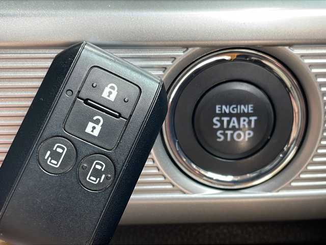 スズキ スペーシア カスタム HYBRID XS ターボ 鳥取県 2018(平30)年 2.3万km アクティブイエロー/ブラック2トーンルーフ 登録時走行距離22406km/4WD/ターボ車/ブラックルーフ/ブラックドアミラー/ブラックリアスポイラー/ワンオーナー/純正8型ナビ/CD/DVD/フルセグTV/Bluetooth/バックカメラ/セーフティサポート（予防安全技術）/デュアルセンサーブレーキサポート/両側パワースライドドア/LEDヘッドランプ/オートライト/合皮ハーフレザーシート/前席シートヒーター/パーソナルテーブル（後席左右）/パドルシフト/SRSエアバック（運転席/助手席/サイド/カーテン）/純正フロアマット/ドアバイザー/ヘッドアップディスプレイ/保証書/取説/スペアキー