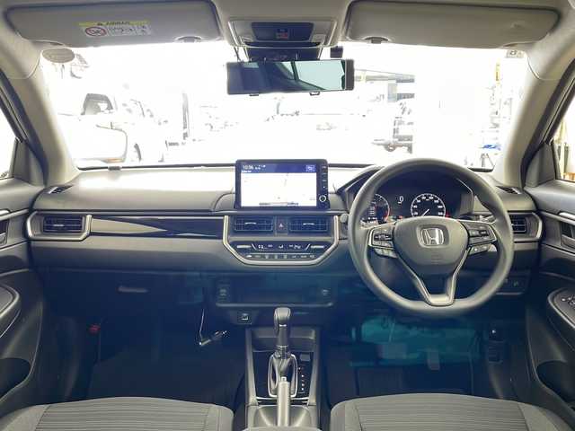 ホンダ ＷＲ－Ｖ X 兵庫県 2025(令7)年 0.1万km プラチナホワイトパール ・純正9インチナビ/・バックカメラ/・ビルトインETC/・Apple Car play/・Android Auto/・USB・ipod・BT/・フルセグTV/・デジタルインナーミラー（ドラレコ付き）/・パドルシフト/・衝突軽減ブレーキ（CMBS）/・先行車発進お知らせ機能/・歩行者事故低減ステアリング/・路外逸脱抑制機能/・標識認識機能/・アダプティブクルーズコントロール（ACC）/・車線維持支援システム（LKAS）/・誤発進抑制機能/・後方誤発進抑制機能/・近距離衝突軽減ブレーキ/・急アクセル抑制機能/・パーキングセンサーシステム/・オートハイビーム/・Honda SENSING/・レーダークルーズコントロール/・スマートキー/・電動格納ミラー/・社外アルミホイール/・LEDライト/・オートマチックハイビーム/・オートライト/・カーテンエアバック/・純正フロアマット