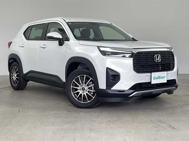 ホンダ ＷＲ－Ｖ X 兵庫県 2025(令7)年 0.1万km プラチナホワイトパール ・純正9インチナビ/・バックカメラ/・ビルトインETC/・Apple Car play/・Android Auto/・USB・ipod・BT/・フルセグTV/・デジタルインナーミラー（ドラレコ付き）/・パドルシフト/・衝突軽減ブレーキ（CMBS）/・先行車発進お知らせ機能/・歩行者事故低減ステアリング/・路外逸脱抑制機能/・標識認識機能/・アダプティブクルーズコントロール（ACC）/・車線維持支援システム（LKAS）/・誤発進抑制機能/・後方誤発進抑制機能/・近距離衝突軽減ブレーキ/・急アクセル抑制機能/・パーキングセンサーシステム/・オートハイビーム/・Honda SENSING/・レーダークルーズコントロール/・スマートキー/・電動格納ミラー/・社外アルミホイール/・LEDライト/・オートマチックハイビーム/・オートライト/・カーテンエアバック/・純正フロアマット