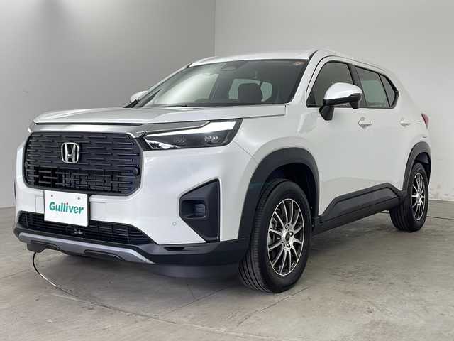 ホンダ ＷＲ－Ｖ X 兵庫県 2025(令7)年 0.1万km プラチナホワイトパール ・純正9インチナビ/・バックカメラ/・ビルトインETC/・Apple Car play/・Android Auto/・USB・ipod・BT/・フルセグTV/・デジタルインナーミラー（ドラレコ付き）/・パドルシフト/・衝突軽減ブレーキ（CMBS）/・先行車発進お知らせ機能/・歩行者事故低減ステアリング/・路外逸脱抑制機能/・標識認識機能/・アダプティブクルーズコントロール（ACC）/・車線維持支援システム（LKAS）/・誤発進抑制機能/・後方誤発進抑制機能/・近距離衝突軽減ブレーキ/・急アクセル抑制機能/・パーキングセンサーシステム/・オートハイビーム/・Honda SENSING/・レーダークルーズコントロール/・スマートキー/・電動格納ミラー/・社外アルミホイール/・LEDライト/・オートマチックハイビーム/・オートライト/・カーテンエアバック/・純正フロアマット