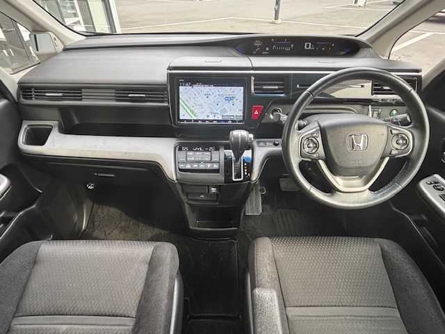 ホンダ ステップワゴン スパーダ ホンダセンシング 宮城県 2019(令1)年 6.5万km プレミアムスパークルブラックパール 登録時走行距離64297km/純正SDナビ/TV・AM・FM・CD・Bluetooth・USB/バックカメラ/わくわくゲート/ホンダセンシング/両側パワースライドドア/ビルトインETC/衝突軽減システム/デュアルエアコン/追従有クルコン/ドライブレコーダー/電動格納ミラー/純正フロアマット/オートライト/ドアバイザー/補助ミラー