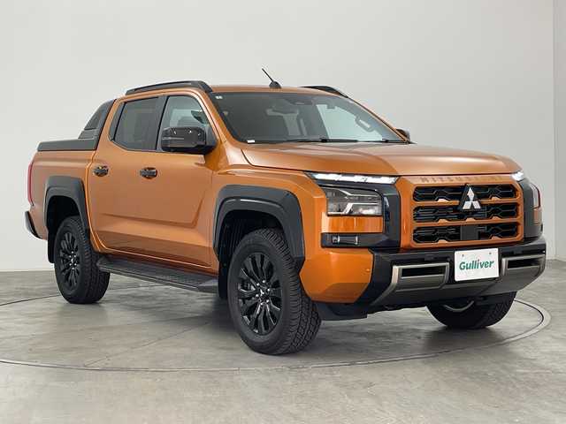 三菱 トライトン GSR 群馬県 2025(令7)年 0.4万km オレンジ 純正ベッドライナー　純正9型ナビ　全周囲カメラ　BSM　ETC　ドラレコ　レザーシート　シートヒーター　衝突被害軽減ブレーキ　レーンアシスト　オートマチックハイビーム　LEDヘッドライト　禁煙