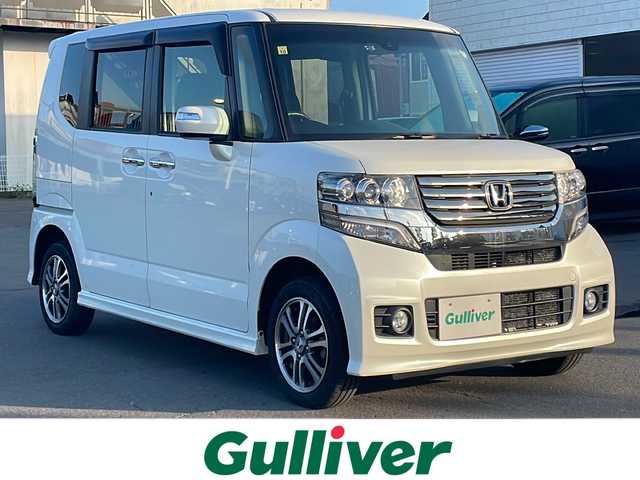 ホンダ Ｎ ＢＯＸ カスタム G Aパッケージ 道東・釧路十勝 2014(平26)年 7.1万km プレミアムホワイトパール 4WD/純正ナビ/(FM AM CD DVD BT TV)/バックカメラ/パワースライドドア/あんしんパッケージ/ETC/ドライブレコーダー/プッシュスタート/スマートキー/ドアバイザー/フロアマット/オートライト/HID/フォグランプ/純正AW
