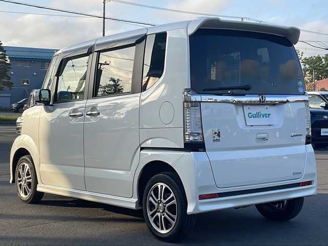 ホンダ Ｎ ＢＯＸ カスタム G Aパッケージ 道東・釧路十勝 2014(平26)年 7.1万km プレミアムホワイトパール 4WD/純正ナビ/(FM AM CD DVD BT TV)/バックカメラ/パワースライドドア/あんしんパッケージ/ETC/ドライブレコーダー/プッシュスタート/スマートキー/ドアバイザー/フロアマット/オートライト/HID/フォグランプ/純正AW