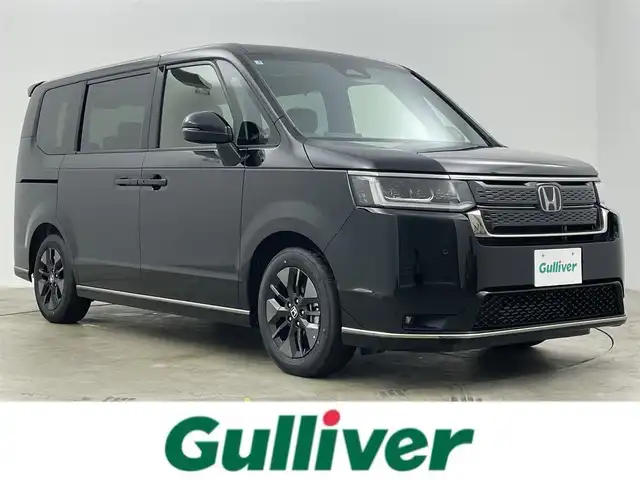 ホンダ ステップワゴン スパーダ 岡山県 2025(令7)年 0.1万km未満 クリスタルブラックパール 登録済未使用車/純正11.4インチHonda CONNECTナビ/（Ｂｌｕｅｔｏｏｔｈ/フルセグＴＶ/Carplay/CD/DVD/UＳＢ接続）/ハーフレザー/衝突軽減ブレーキシステム/レーダークルーズコントロール/シートヒーター/ＬＥＤヘッドライト/オートハイビーム/フォグランプ/バックカメラ/ブラインドスポットモニター/両側パワースライドドア/プッシュスタート/スマートキー×2　/新車保証書/取扱説明書