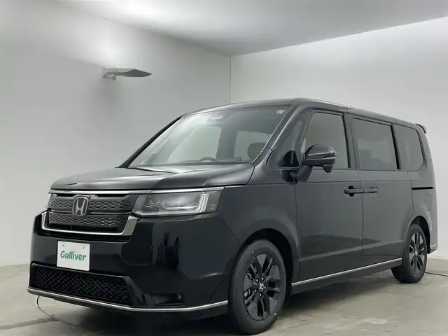 ホンダ ステップワゴン スパーダ 岡山県 2025(令7)年 0.1万km未満 クリスタルブラックパール 登録済未使用車/純正11.4インチHonda CONNECTナビ/（Ｂｌｕｅｔｏｏｔｈ/フルセグＴＶ/Carplay/CD/DVD/UＳＢ接続）/ハーフレザー/衝突軽減ブレーキシステム/レーダークルーズコントロール/シートヒーター/ＬＥＤヘッドライト/オートハイビーム/フォグランプ/バックカメラ/ブラインドスポットモニター/両側パワースライドドア/プッシュスタート/スマートキー×2　/新車保証書/取扱説明書