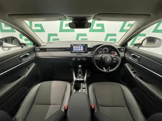 ホンダ ヴェゼル ハイブリッド e:HEV Z 鹿児島県 2025(令7)年 0.1万km未満 プラチナホワイトパール Honda CONNECTディスプレー+ETC2.0車載器+ワイヤレス充電器/純正フロントグリル（ベルリナブラック）/ホンダセンシング　/バックカメラ/ブラインドスポットモニター　/電動パーキングブレーキ　/オートブレーキホールド　/オールオートウィンドウ　/革巻きステアリング/ステアリングヒーター/パドルシフト