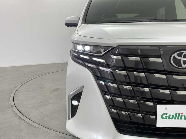 トヨタ アルファード Z 群馬県 2025(令7)年 0.1万km未満 プラチナホワイトパールマイカ 登録済未使用車　左右独立ムーンルーフ　純正１３．２型有機ＥＬ後席モニター　ヘッドアップディスプレイ　純正１４型ナビ　デジタルインナーミラー　置くだけ充電器　スペアタイヤ　全周囲カメラ　ＢＳＭ　禁煙
