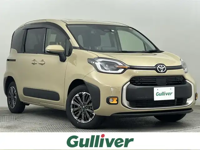 トヨタ シエンタ ハイブリッド Z 道央・札幌 2023(令5)年 0.6万km ベージュ ・４WD/・純正モデリスタAW/・純正ディスプレイオーディオ/・ナビキット/　BT/USB/Miracast/フルセグ/・バックカメラ/・ビルトインETC/・前後ドライブレコーダー/・トヨタセーフティセンス/・プリクラッシュセーフティ/・レーンキープアシスト/・レーダークルーズコントロール/・オートハイビーム/・クリアランスソナー/・BSM/・PDA/・PKSB/・RSA/・両側パワースライドドア/・LEDヘッドライト/・フォグライト/・オートライト/・プッシュスタート/・スマートキー/・純正フロアマット/・ドアバイザー/・保証書