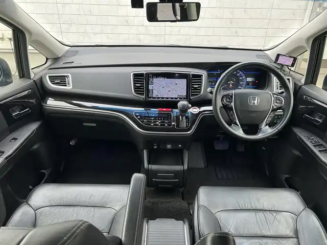 ホンダ オデッセイ ハイブリッド アブソルート・EXホンダセンジング 埼玉県 2019(平31)年 9.9万km クリスタルブラックパール ホンダ純正ナビオーディオ/（AM/FM/フルセグTV/BT/CD/DVD/SD）/フルセグTV/全方位カメラ/ホンダセンシング/・アダプティブクルーズコントロール/・LKAS/・先行車発信お知らせ機能/・標識自動認識機能/リモコンエンジンスターター/電子制御パーキングブレーキ/ブレーキホールド/ホンダ純正フリップダウンモニター/ビルトインETC2.0/ホンダ純正アドバンスドルームミラー/ホンダ純正ナビ連動前方ドラレコ/ホンダ純正後方単独ドラレコ/アイドリングストップ/コーナーセンサー前後/オートライト/ダブルエアコン/プッシュスタートボタン/スマートキー×2/ステアリングスイッチ/純正フロアマット/USBチャージャー/サイドステップガーニッシュ（LEDイルミ付）/テールゲートストラップ/車両/ナビ 取扱説明書/保証書