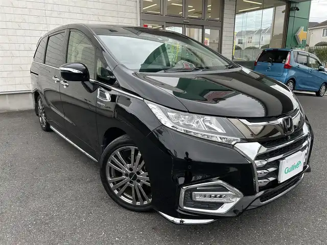 ホンダ オデッセイ ハイブリッド アブソルート・EXホンダセンジング 埼玉県 2019(平31)年 9.9万km クリスタルブラックパール ホンダ純正ナビオーディオ/（AM/FM/フルセグTV/BT/CD/DVD/SD）/フルセグTV/全方位カメラ/ホンダセンシング/・アダプティブクルーズコントロール/・LKAS/・先行車発信お知らせ機能/・標識自動認識機能/リモコンエンジンスターター/電子制御パーキングブレーキ/ブレーキホールド/ホンダ純正フリップダウンモニター/ビルトインETC2.0/ホンダ純正アドバンスドルームミラー/ホンダ純正ナビ連動前方ドラレコ/ホンダ純正後方単独ドラレコ/アイドリングストップ/コーナーセンサー前後/オートライト/ダブルエアコン/プッシュスタートボタン/スマートキー×2/ステアリングスイッチ/純正フロアマット/USBチャージャー/サイドステップガーニッシュ（LEDイルミ付）/テールゲートストラップ/車両/ナビ 取扱説明書/保証書