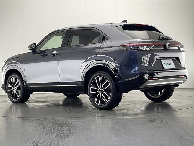 ホンダ ヴェゼル ハイブリッド e:HEV Z 宮崎県 2021(令3)年 1.4万km メテオロイドグレーメタリック 禁煙車/ホンダセンシング/純正9型ディスプレイオーディオナビTV/（HONDA CONNECT/Bluetooth/FMAM/フルセグTV)/純正バックカメラ/純正ビルトイン2.0ETC/純正LEDオートライト/純正LEDフォグ/純正18インチアルミ/純正フロアマット/アダプティブクルーズコントロール/レーンディパーチャーアラート/クリアランスソナー/ブラインドスポットモニター/パワーバックドア/パドルシフト/ハーフレザーシート/前席シートヒーター/置くだけ充電/デュアルオートエアコン/ステアリングヒーター/スマートキー/プッシュエンジンスタート/新車時保証書/取扱い説明書