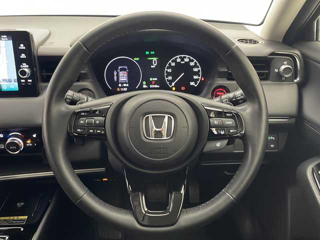 ホンダ ヴェゼル ハイブリッド e:HEV Z 宮崎県 2021(令3)年 1.4万km メテオロイドグレーメタリック 禁煙車/ホンダセンシング/純正9型ディスプレイオーディオナビTV/（HONDA CONNECT/Bluetooth/FMAM/フルセグTV)/純正バックカメラ/純正ビルトイン2.0ETC/純正LEDオートライト/純正LEDフォグ/純正18インチアルミ/純正フロアマット/アダプティブクルーズコントロール/レーンディパーチャーアラート/クリアランスソナー/ブラインドスポットモニター/パワーバックドア/パドルシフト/ハーフレザーシート/前席シートヒーター/置くだけ充電/デュアルオートエアコン/ステアリングヒーター/スマートキー/プッシュエンジンスタート/新車時保証書/取扱い説明書