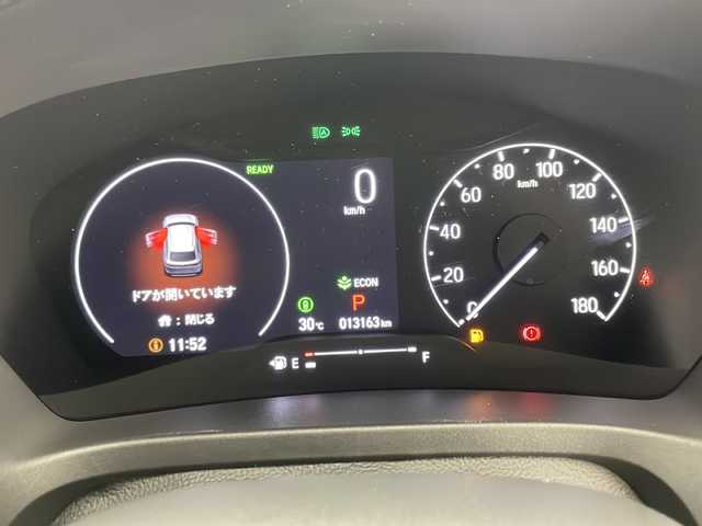 ホンダ ヴェゼル ハイブリッド e:HEV Z 宮崎県 2021(令3)年 1.4万km メテオロイドグレーメタリック 禁煙車/ホンダセンシング/純正9型ディスプレイオーディオナビTV/（HONDA CONNECT/Bluetooth/FMAM/フルセグTV)/純正バックカメラ/純正ビルトイン2.0ETC/純正LEDオートライト/純正LEDフォグ/純正18インチアルミ/純正フロアマット/アダプティブクルーズコントロール/レーンディパーチャーアラート/クリアランスソナー/ブラインドスポットモニター/パワーバックドア/パドルシフト/ハーフレザーシート/前席シートヒーター/置くだけ充電/デュアルオートエアコン/ステアリングヒーター/スマートキー/プッシュエンジンスタート/新車時保証書/取扱い説明書