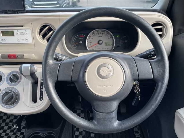 ダイハツ ミラ ココア L 道東・釧路十勝 2013(平25)年 6.2万km コットンアイボリー 4WD/ポータブルナビ(ワンセグTV、AM、FM、CD、SD)/純正オーディオ/アイドリングストップ/積み込みスタッドレスタイヤスチール付/リモコンキー/ライトレベライザー/純正フロアマット/電格ミラー