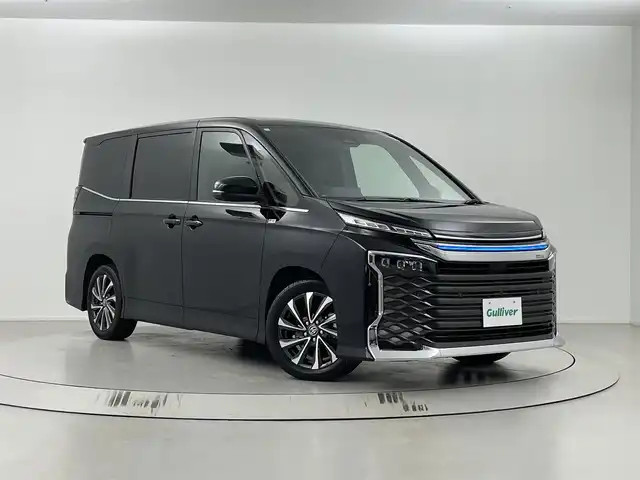 トヨタ ヴォクシー ハイブリッド S－Z 埼玉県 2024(令6)年 2.9万km アティチュードブラックマイカ 純正ナビ　/アラウンドビューカメラ　/デジタルインナーミラー　/ＢＳＭ　/トヨタチームメイト/ＥＴＣ２．０　/追従式クルーズコントロール　/パワーバックドア　/オットマン　/純正アルミホイール　/オートマティックハイビーム　/衝突軽減システム/ブレーキホールド