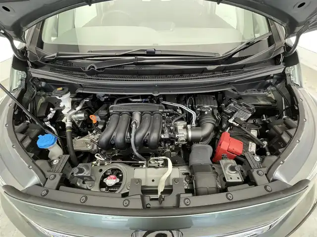 ホンダ フリード＋ G 滋賀県 2024(令6)年 0.4万km シルバーミストグリーンM 禁煙車/純正7型ナビ/CD.DVD.Bluetooth.フルセグ/バックカメラ/ホンダセンシング/・衝突軽減ブレーキ/・誤発進抑制機能/・後方誤発進抑制機能/・歩行者事故低減ステアリング/・路外逸脱抑制機能/・アダプティブクルーズコントロール/・車線維持支援システム/・先行車発進お知らせ機能/・標識認識機能/LEDヘッドライト/オートライト/両側パワースライドドア/ETC/ステアリングスイッチ/前席シートヒーター/アイドリングストップ/プッシュスタート/スマートキー