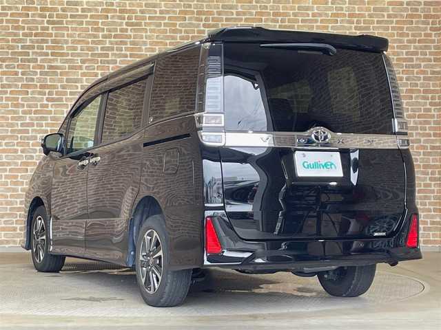 トヨタ ヴォクシー ZS 煌Ⅲ 岩手県 2021(令3)年 2.4万km ブラック ４WD/12.1インチ後席モニター/両側パワースライドドア/トヨタセーフティセンスC/プリクラッシュセーフティ/レーンディパーチャーアラート/オートマチックハイビーム/先行車発進お知らせ機能/クルーズコントロール/クリアランスソナー/MTモード付きAT/横滑り防止装置/アイドリングストップ/リヤオートエアコン/ロールサンシェード/ウォークスルー/純正9インチナビ/（CD/DVD/フルセグ/SD/Bluetooth）/バックカメラ/ETC/ドライブレコーダー/LEDヘッドライト/純正16インチアルミホイール