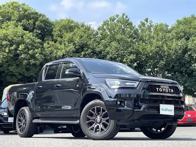 トヨタ ハイラックス Z GRスポーツ 東京都 2022(令4)年 1.4万km アティチュードブラックマイカ ワンオーナー/純正ナビ/・Bluetoothオーディオ/AppleCarPlay/Androidauto/パノラミックビューモニター/ドライブレコーダー前後（TZ-DR210）/プリクラッシュセーフティ/レーンディパーチャーアラート/レーダークルーズコントロール/パドルシフト/合皮ハーフレザーシート/LEDヘッドライト/純正アルミホイール18インチ/純正フロアマット/保証書/取扱説明書/スペアキー
