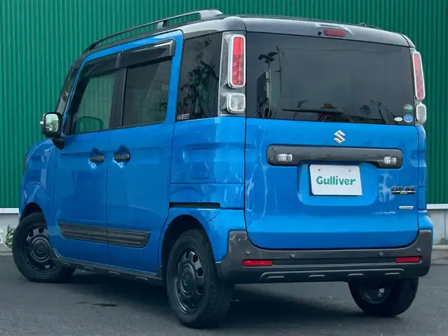 スズキ スペーシア ギア HYBRID XZターボ 宮城県 2019(令1)年 5.7万km ブリスクブルーメタリック/ガンメタリック2トーンルーフ 全方位モニター用カメラパッケージ/・ヘッドアップディスプレイ/・進入禁止標識認識機能/・全方位モニター用カメラ/・USBソケット/・GPSアンテナ/・TV用アンテナ/＝＝＝/セーフティサポート/・デュアルセンサーブレーキサポート/・車線逸脱警報機能/・先行車発進お知らせ機能/・後退時ブレーキサポート/・リアパーキングセンサー/・誤発進抑制機能/・ふらつき警報/・ハイビームアシスト/・後方誤発進抑制機能/純正8インチナビ（CN-RZ846）/・CD/DVD/・Bluetooth/・フルセグTV/ビルトインETC/ドライブレコーダー/シートヒーター/両側パワースライドドア/革巻きステアリング/ステアリングスイッチ/パドルシフト/LEDヘッドランプ/フォグランプ/オートライト/スマートキー/プッシュスタート/電動格納ミラー/純正14インチAW/純正ラバーマット/純正ドアバイザー/Wエアバッグ