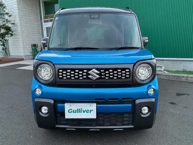 スズキ スペーシア ギア HYBRID XZターボ 宮城県 2019(令1)年 5.7万km ブリスクブルーメタリック/ガンメタリック2トーンルーフ 全方位モニター用カメラパッケージ/・ヘッドアップディスプレイ/・進入禁止標識認識機能/・全方位モニター用カメラ/・USBソケット/・GPSアンテナ/・TV用アンテナ/＝＝＝/セーフティサポート/・デュアルセンサーブレーキサポート/・車線逸脱警報機能/・先行車発進お知らせ機能/・後退時ブレーキサポート/・リアパーキングセンサー/・誤発進抑制機能/・ふらつき警報/・ハイビームアシスト/・後方誤発進抑制機能/純正8インチナビ（CN-RZ846）/・CD/DVD/・Bluetooth/・フルセグTV/ビルトインETC/ドライブレコーダー/シートヒーター/両側パワースライドドア/革巻きステアリング/ステアリングスイッチ/パドルシフト/LEDヘッドランプ/フォグランプ/オートライト/スマートキー/プッシュスタート/電動格納ミラー/純正14インチAW/純正ラバーマット/純正ドアバイザー/Wエアバッグ