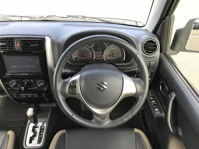 スズキ ジムニー ランドベンチャー 鳥取県 2015(平27)年 3.7万km パールホワイト ４・W・D/ターボ車/社外ナビ/フルセグ/CD/DVD/BT/ETC2.0/前後ドライブレコーダー/レザーシート/運転席シートヒーター/フォグライト/４WD切替スイッチ/背面タイヤ/キーレスキー/電動格納ミラー/ウィンカーミラー/純正16インチアルミホイール/フロアマット
