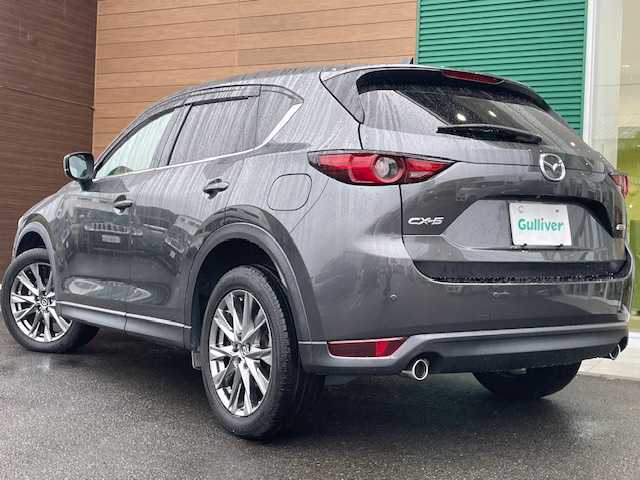 マツダ ＣＸ－５ XD エクスクルーシブモード 静岡県 2019(平31)年 2.7万km マシーングレープレミアムM ワンオーナー/純正SDナビ/バックカメラ/BOSEサウンド/フリップダウンモニター/Apple CarPlay/Android Auto/ステアリングリモコン/ヘッドアップディスプレイ/ハーフレザーシート/前席シートヒーター・エアシート/ステアリングヒーター/レーダークルーズコントロール/アイドリングストップ/パワーバックドア/コーナーセンサー/ステアリングヒーター/保証証/取扱説明書