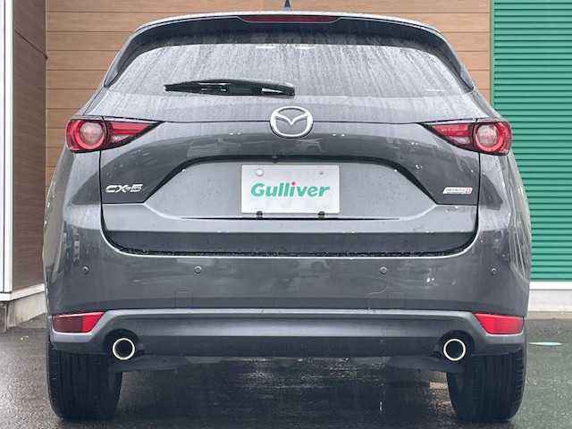マツダ ＣＸ－５ XD エクスクルーシブモード 静岡県 2019(平31)年 2.7万km マシーングレープレミアムM ワンオーナー/純正SDナビ/バックカメラ/BOSEサウンド/フリップダウンモニター/Apple CarPlay/Android Auto/ステアリングリモコン/ヘッドアップディスプレイ/ハーフレザーシート/前席シートヒーター・エアシート/ステアリングヒーター/レーダークルーズコントロール/アイドリングストップ/パワーバックドア/コーナーセンサー/ステアリングヒーター/保証証/取扱説明書