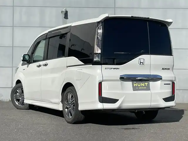 ホンダ ステップワゴン スパーダ ハイブリッド G EX ホンダセンシング 千葉県 2019(令1)年 6.9万km プラチナホワイトパール ホンダセンシング/・衝突軽減ブレーキ/レーンキープアシスト/・レーダークルーズコントロール/誤発進抑制/・先行車発進お知らせ/標識認識機能/純正フリップダウンモニター/純正10インチナビ(VXU-197SWi)/・フルセグ/BT/DVD/CD/USB/バックカメラ/ステアリングスイッチ/ETC/アイドリングストップ/両側パワースライドドア/電動パーキングブレーキ/ハーフレザーシート/シートヒーター(D/N席)/LEDヘッドライト/オートライト/フォグライト/スマートキー/プッシュスタート/純正フロアマット/純正16インチAW