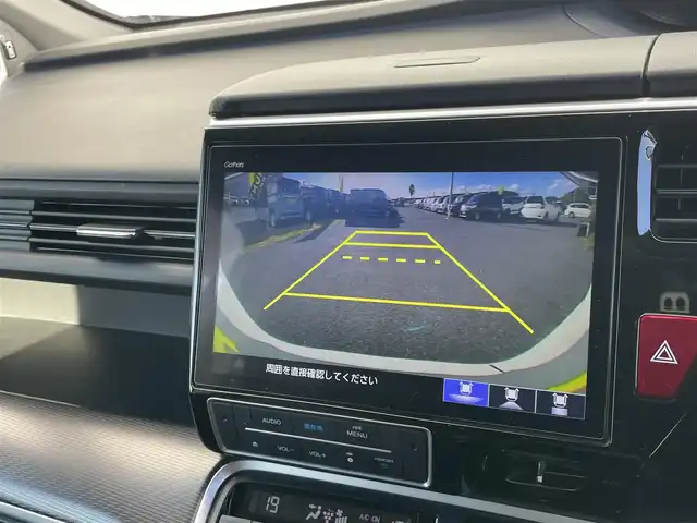 ホンダ ステップワゴン スパーダ ハイブリッド G EX ホンダセンシング 千葉県 2019(令1)年 6.9万km プラチナホワイトパール ホンダセンシング/・衝突軽減ブレーキ/レーンキープアシスト/・レーダークルーズコントロール/誤発進抑制/・先行車発進お知らせ/標識認識機能/純正フリップダウンモニター/純正10インチナビ(VXU-197SWi)/・フルセグ/BT/DVD/CD/USB/バックカメラ/ステアリングスイッチ/ETC/アイドリングストップ/両側パワースライドドア/電動パーキングブレーキ/ハーフレザーシート/シートヒーター(D/N席)/LEDヘッドライト/オートライト/フォグライト/スマートキー/プッシュスタート/純正フロアマット/純正16インチAW