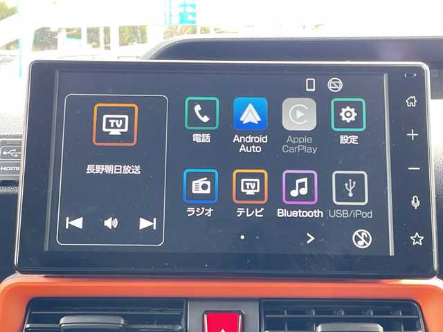 ダイハツ タント ファンクロスターボ 長野県 2024(令6)年 2.5万km ブラックマイカメタリック/サンドベージュメタリック 禁煙車/９インチスマホ連携ディスプレイオーディオ/（フルセグTV/Bluetooth/AppleCarPlay/AndroidAuto/HDMIソケット）/スマートアシスト/・衝突警報機能/・衝突回避支援ブレーキ/・ブレーキ制御機能付誤発進抑制機能/・車線逸脱抑制制御機能/・車線逸脱警報機能/・先行車発進お知らせ機能/・全車速追従機能付アダプティブクルーズコントロール/・ふらつき警報機能/・標識認識機能/・レーンキープコントロール/・コーナーセンサー/・アダプティブドライビングビーム/パノラマモニター/ビルトインETC/両側パワースライドドア/ドライブレコーダー/前席シートヒーター/革巻きステアリング/ステアリングスイッチ/電動パーキングブレーキ/ブレーキホールド/LEDヘッドライト/フォグランプ/オートライト/スマートキー/Pスタート/電動格納ミラー/純正１５インチAW/純正フロアマット/ルーフレール