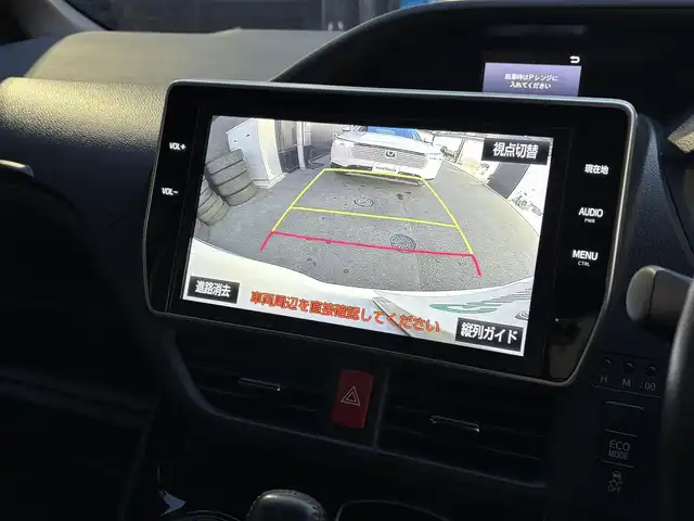 トヨタ ノア Si ダブルバイビー 滋賀県 2018(平30)年 7.3万km ホワイトパールクリスタルシャイン 純正9インチナビ/【Bluetooth/フルセグTV/CD/DVD】/純正フリップダウンモニター/バックカメラ/ETC/前後ドライブレコーダー/トヨタセーフティセンス/・プリクラッシュセーフティ/・レーンディパーチャーアラート/・オートマチックハイビーム/・先行車発進お知らせ機能/両側パワースライドドア/ハーフレザーシート/LEDライト/スマートキー/クルーズコントロール/ステアリングスイッチ