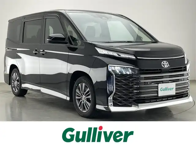 トヨタ ヴォクシー S－G 愛知県 2023(令5)年 2万km アティチュードブラックマイカ 純正１０．５型ナビＴＶ　ＤＶＤデッキＨ　ＤＭＩ　純正１４型後席モニター　ユニバーサルステップ　デジタルインナーミラー　ＥＴＣ２．０　電動パーキング　両側パワスラ　衝突軽減　追従クルコン　ＬＥＤライト　純正OPデジタルインナーミラー型前後ドラレコ　禁煙車