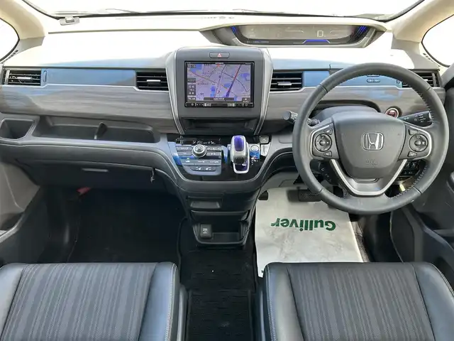 ホンダ フリード ハイブリット EX 兵庫県 2019(平31)年 2.3万km モダンスティールM 社外SDナビ/BT/フルセグ/CD/DVD/ETC/ドライブレコーダー/バックカメラ/前者追従クルーズコントロール/両側パワースライドドア/ステアリングリモコン/ハーフレザーシート/シートヒーター/プラズマクラスター/ABS/横滑り防止装置