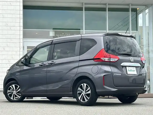 ホンダ フリード ハイブリット EX 兵庫県 2019(平31)年 2.3万km モダンスティールM 社外SDナビ/BT/フルセグ/CD/DVD/ETC/ドライブレコーダー/バックカメラ/前者追従クルーズコントロール/両側パワースライドドア/ステアリングリモコン/ハーフレザーシート/シートヒーター/プラズマクラスター/ABS/横滑り防止装置