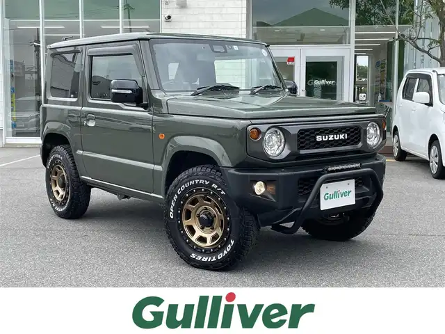 スズキ ジムニー XC 鳥取県 2019(令1)年 3.1万km ジャングルグリーン 4WD/ターボ/ワンオーナー/デュアルセンサーブレーキサポート/純正8型ナビ【CN-RZ843】/・フルセグ/・Bluetooth/・CD/DVD/バックカメラ/スマートキー/プッシュスタート/AAC/クルーズコントロール/ETC/ドライブレコーダー /前席シートヒーター/背面タイヤ＆ハードカバー/社外16AW＆ブロックタイヤ/社外バンパーガード/ABS/レーンキープアシスト/セキュリティアラーム/LEDヘッドライト/オートライト/フォグランプ/W&サイドエアバック